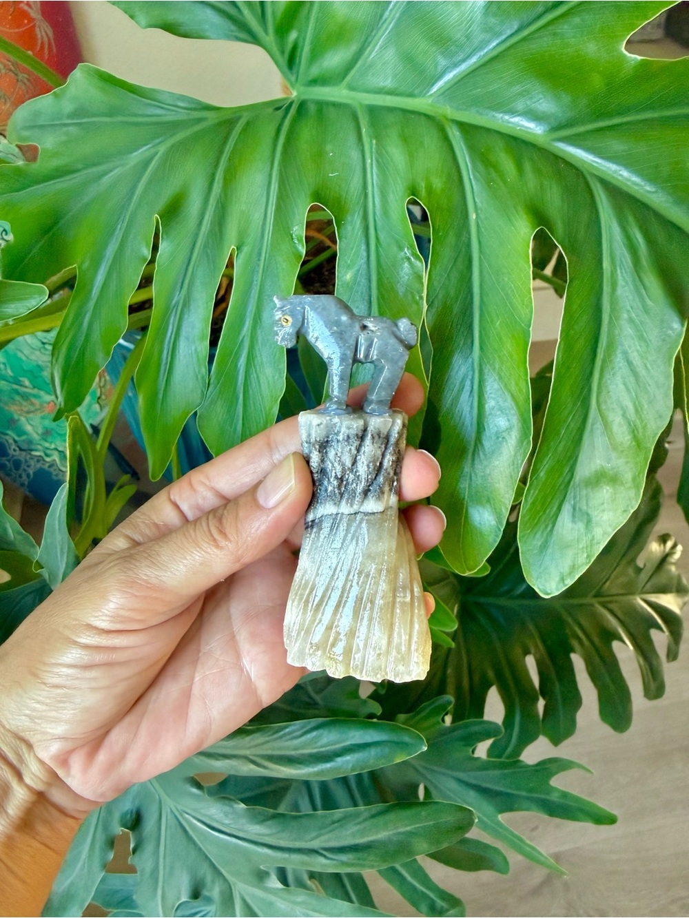 Horse figurine on Calcite